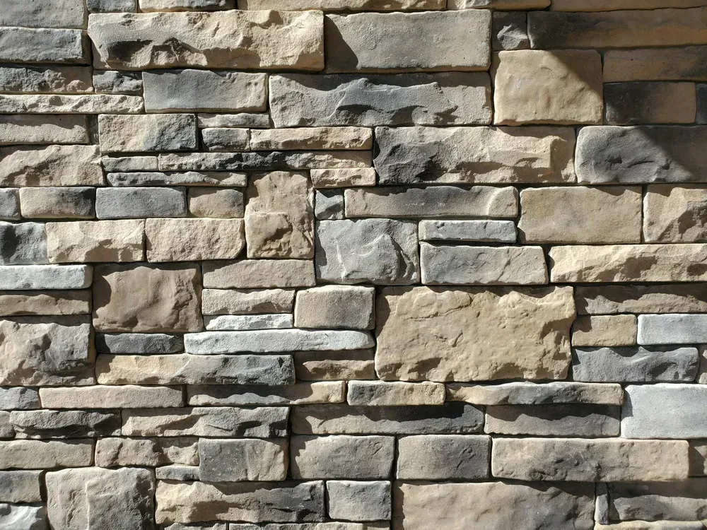 Close-up of dry stack stone texture in warm light